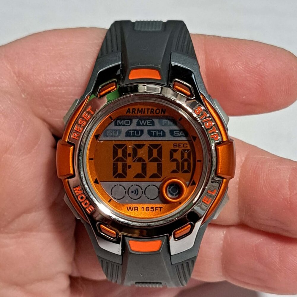 Armitron grey, silver and orange sport watch